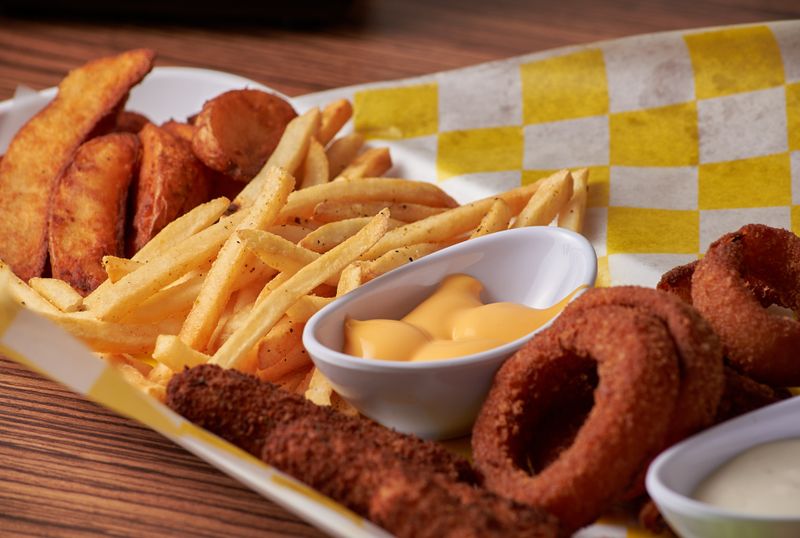 Mozzarella Sticks golden fried appetizer at Marcos